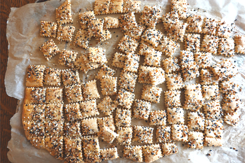 Sourdough Everything Crackers baked on a cookie sheet 