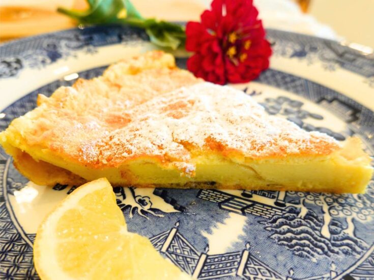 slice of einkorn German pancake on a blue willow plate