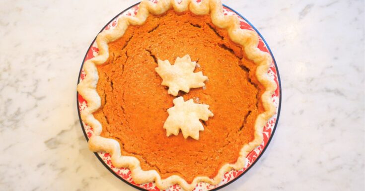 pumpkin pie from scratch decorated with pie crust leaves